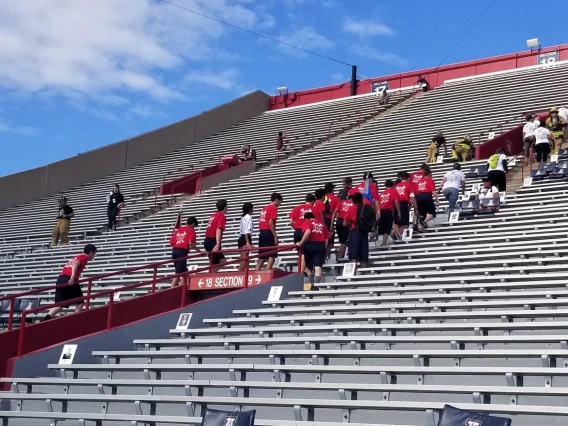 Tower challenge participants climbing stairs