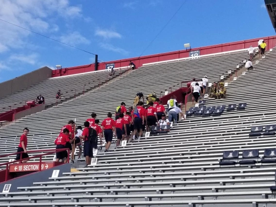 Tower challenge participants climbing stairs