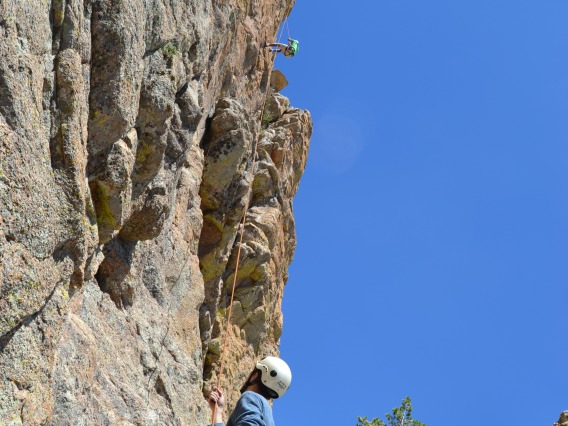 Climber holding belay line