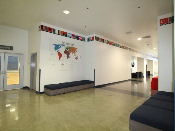 Map and list of countries display in hallway at Campus Rec