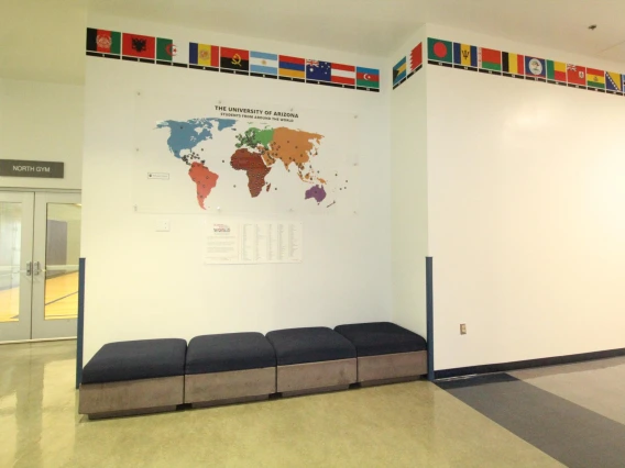 Map and list of countries display in hallway at Campus Rec