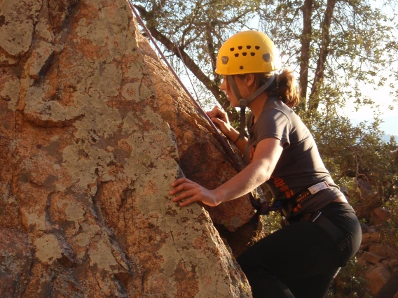 Rock climber climbing