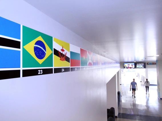 Flags display in hallway at Campus Rec