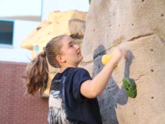 Climber on boulder wall