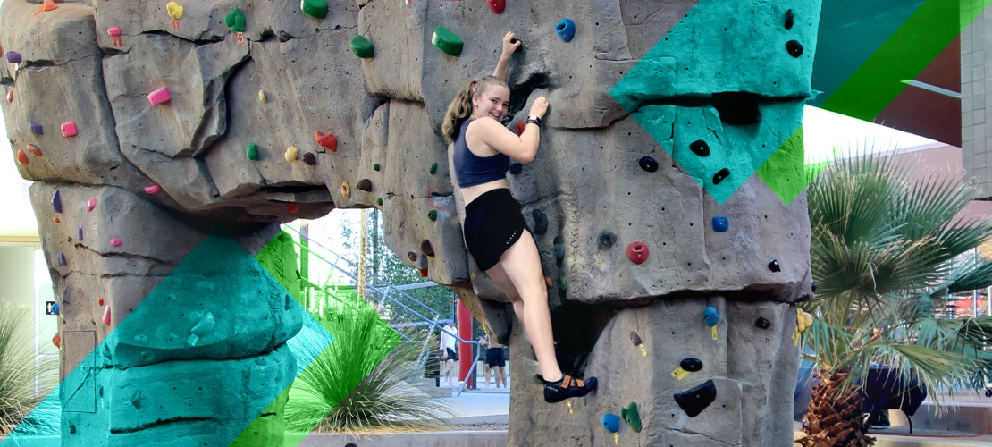 image of a women climbing