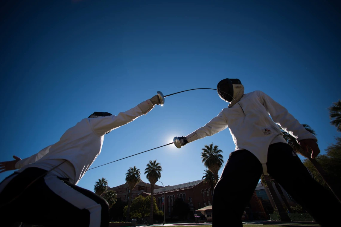 Two fencers competing