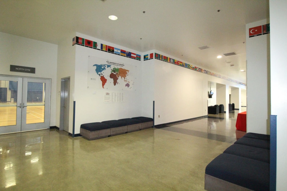 Map and list of countries display in hallway at Campus Rec