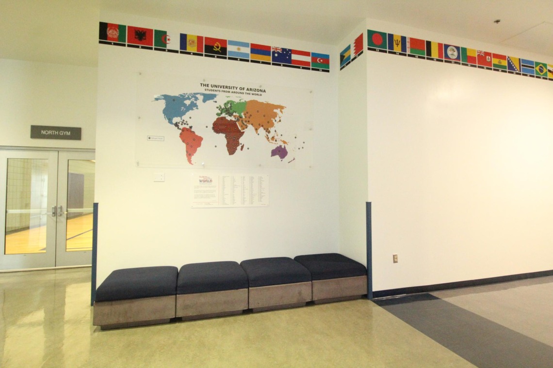 Map and list of countries display in hallway at Campus Rec