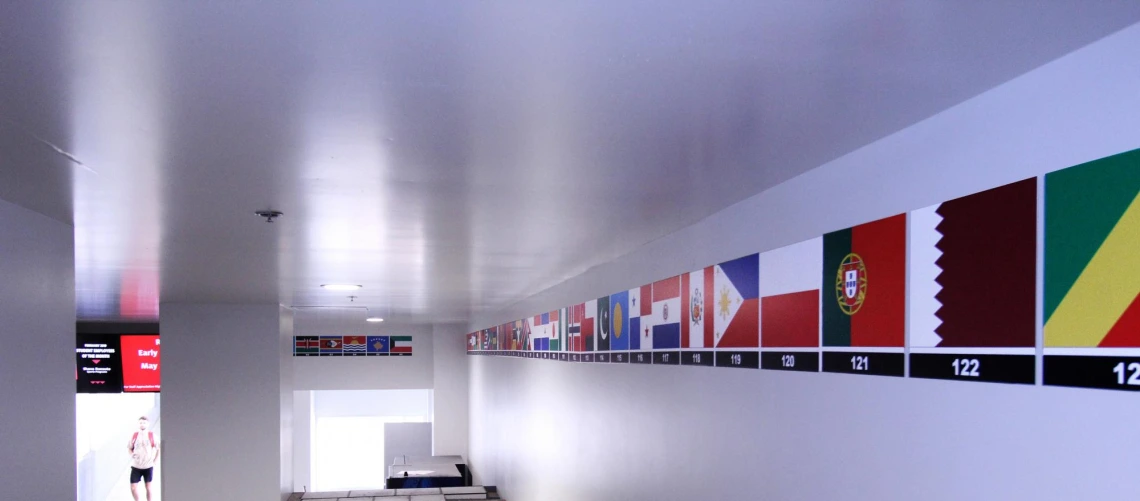 Flags display in hallway at Campus Rec