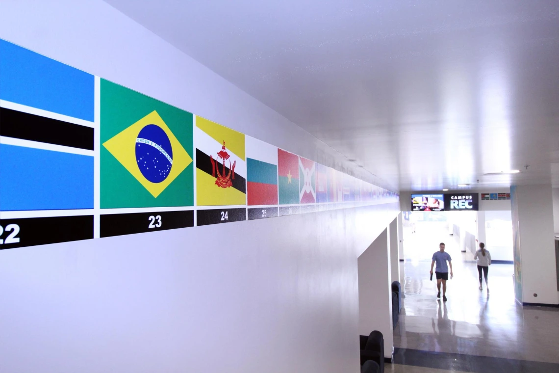 Flags display in hallway at Campus Rec