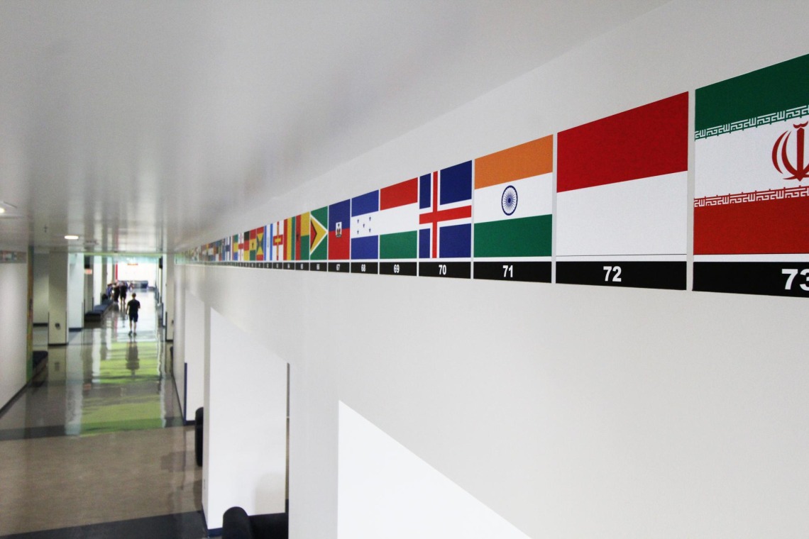 Flags display in hallway at Campus Rec