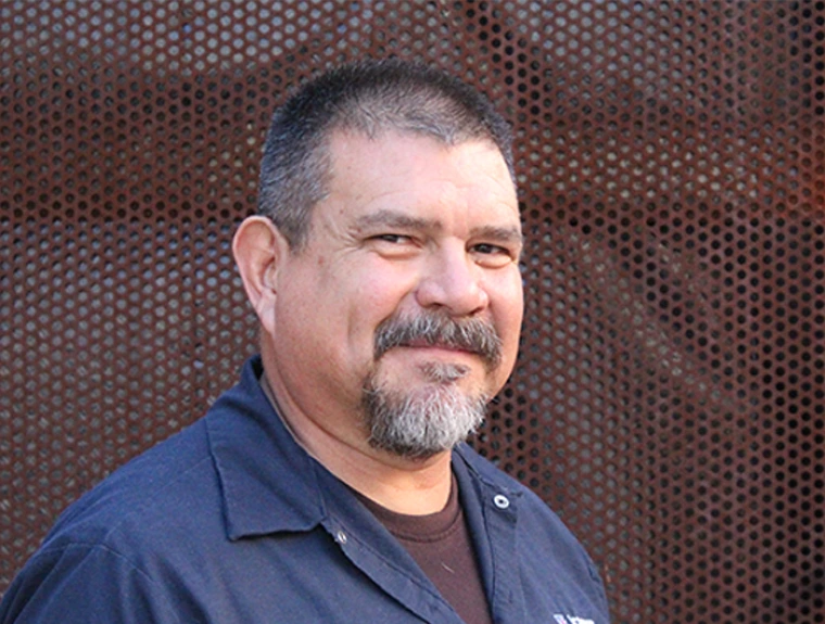 Headshot of John Arvizu