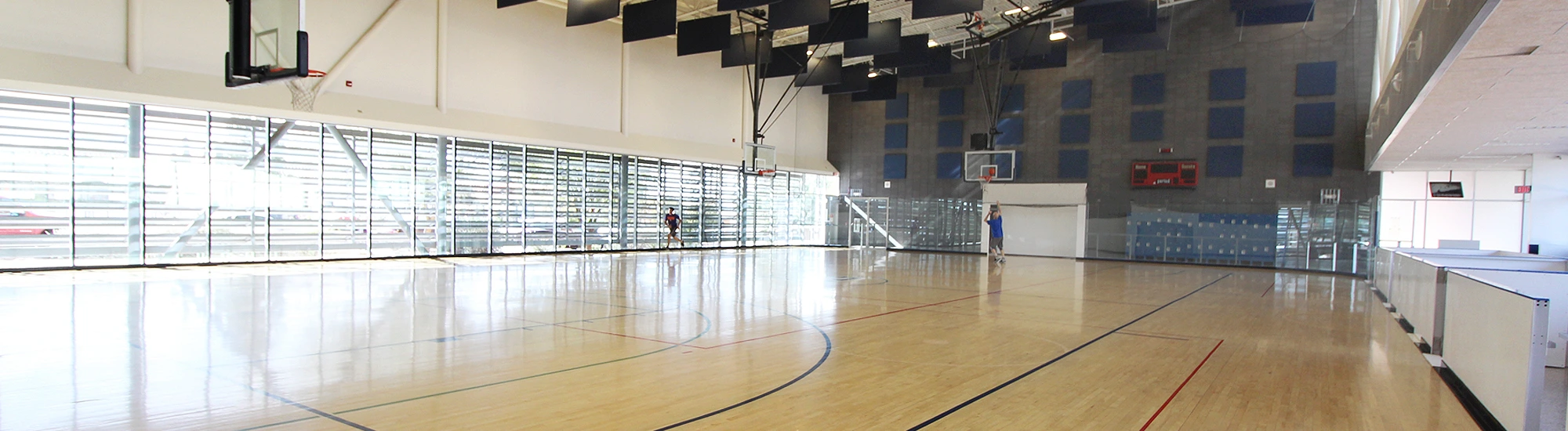 Two people utilizing the MAC Gym at Campus Rec UArizona