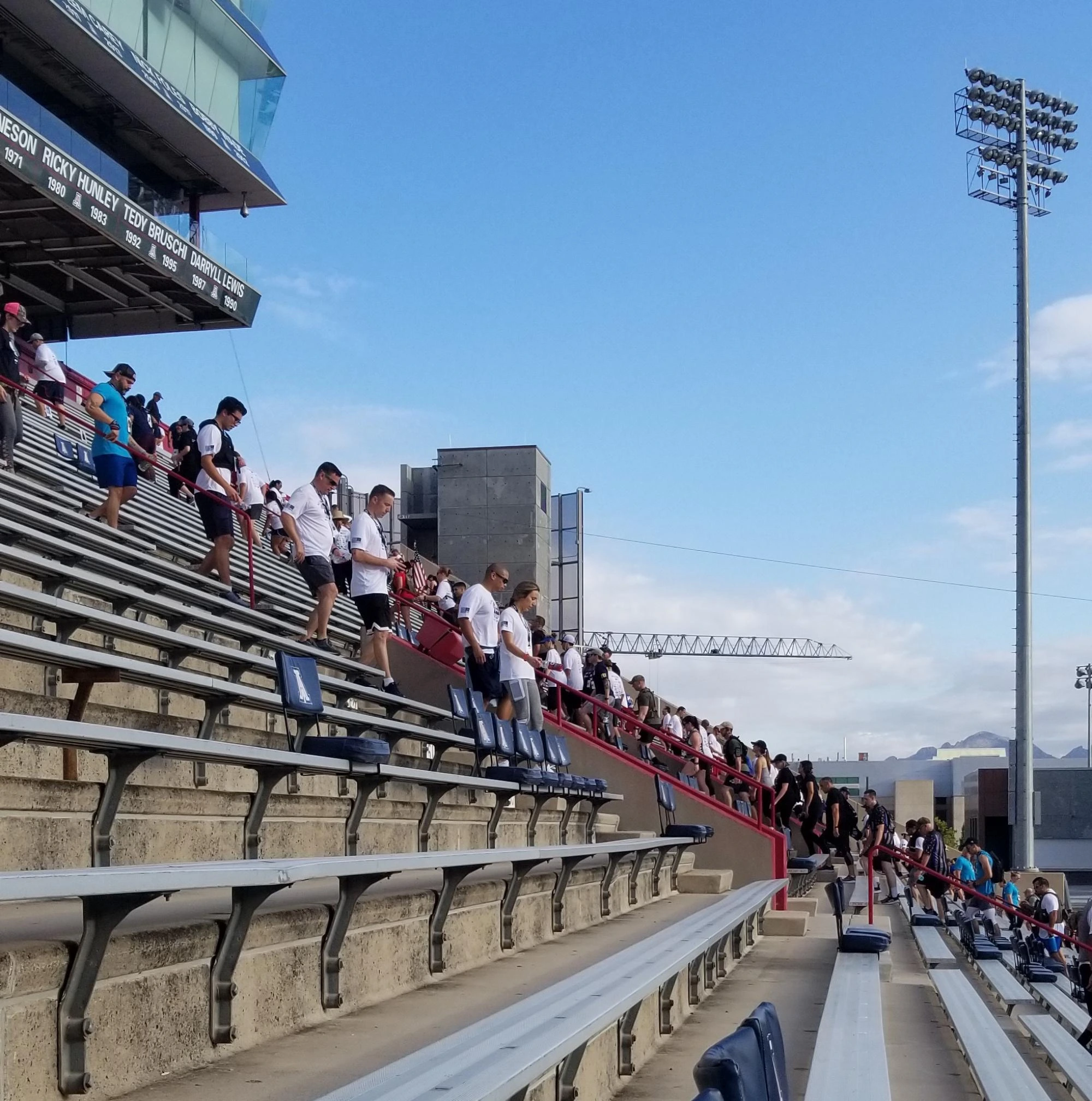 Community members participating in tower challenge
