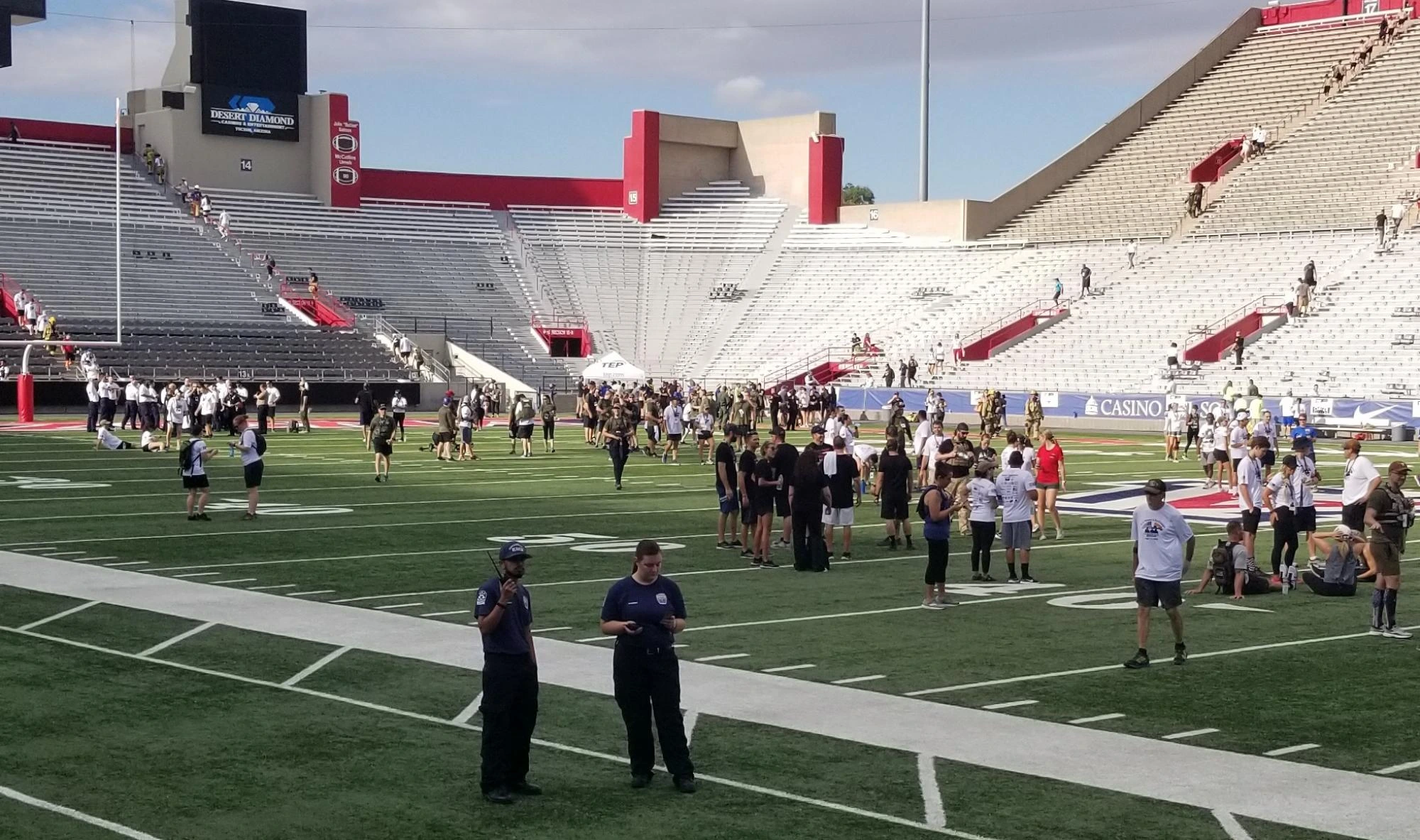 Crowd photo of tower challenge event, featuring first responders, military, and community members