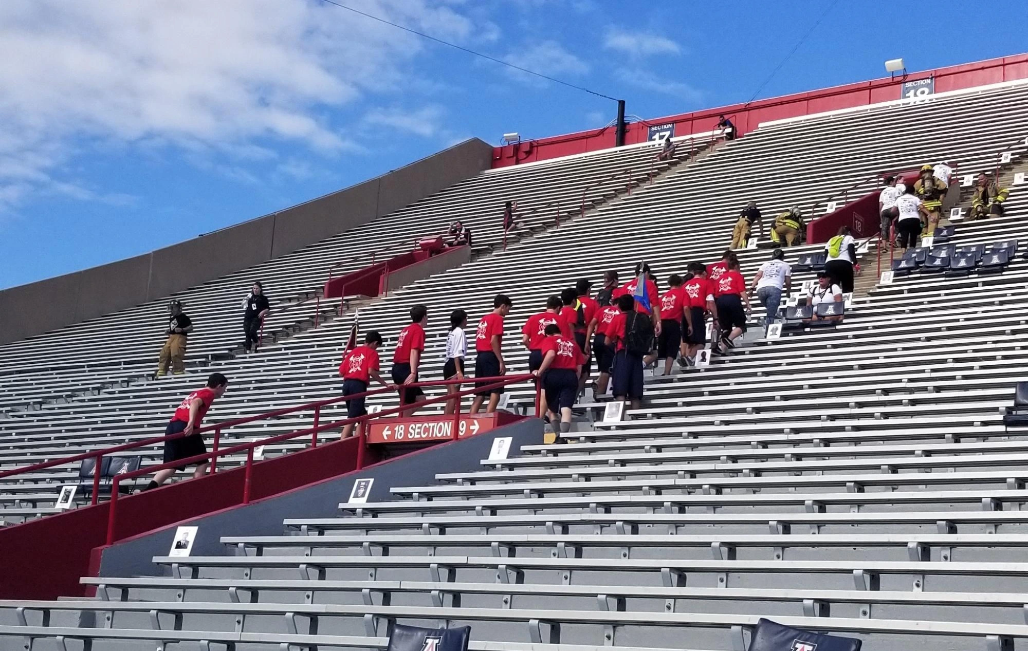 Tower challenge participants climbing stairs