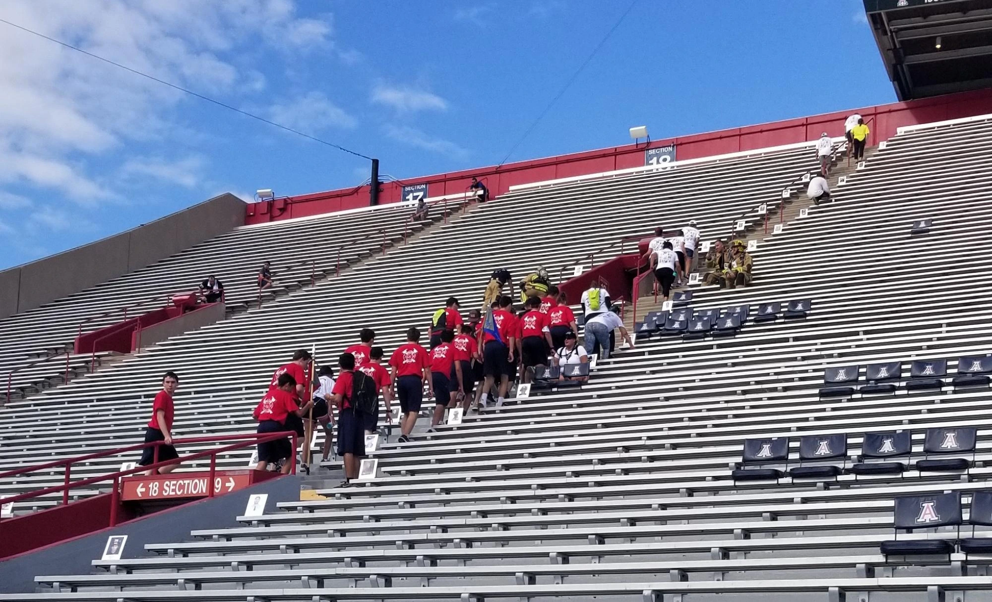 Tower challenge participants climbing stairs