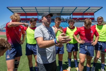 Sean Duffy coaching a group of rugby players